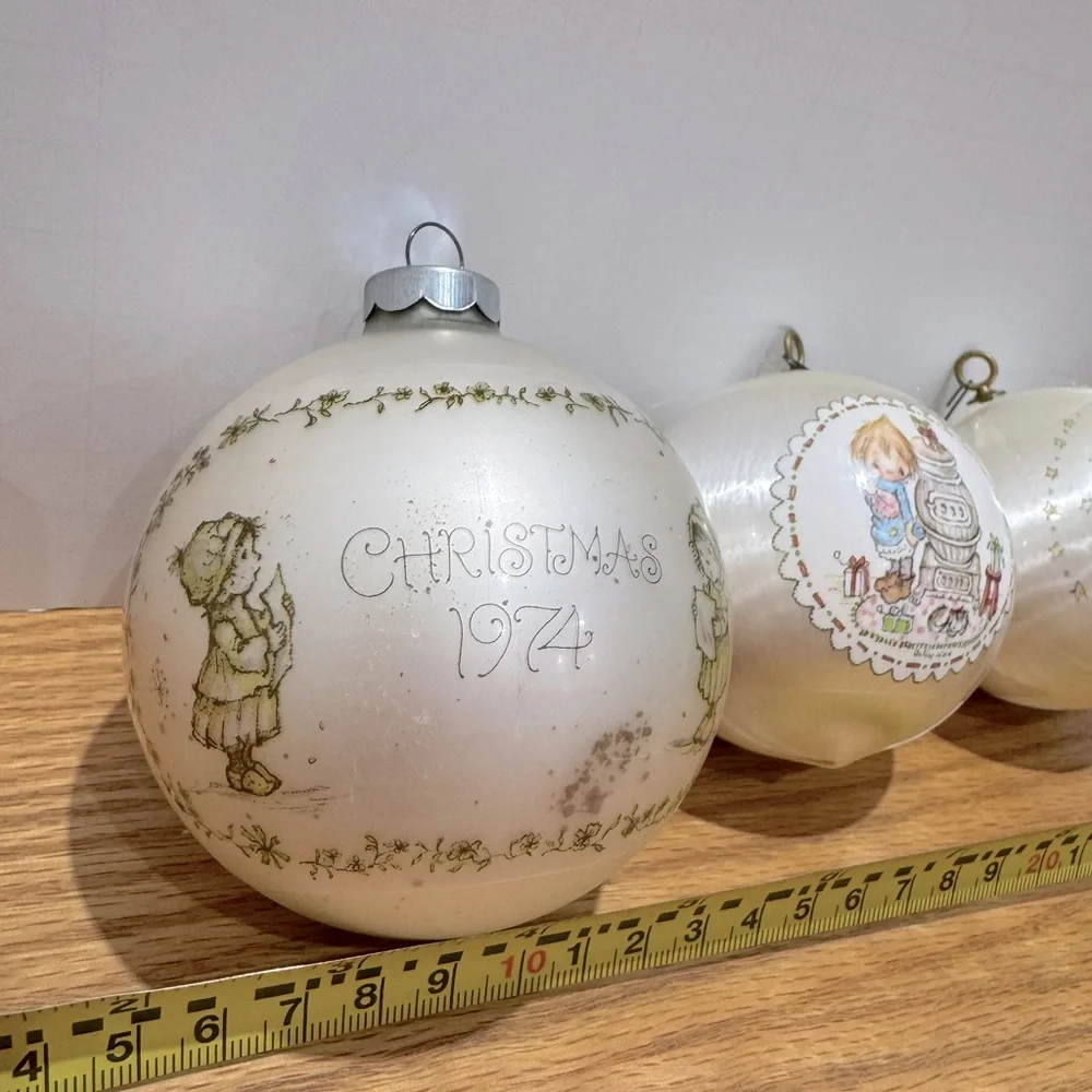 Vintage hallmark Ornament bulbs dated 1974, 1975, 1976